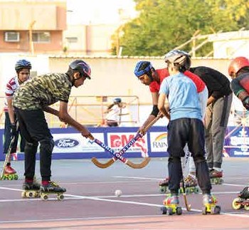 Skaters playing roller hockey