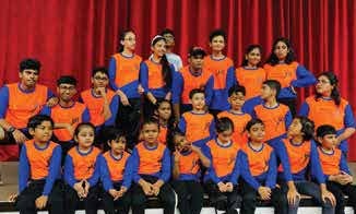 MSK skaters lined up in orange and blue kit